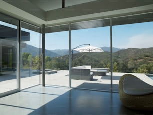 a room with a view of mountains and trees