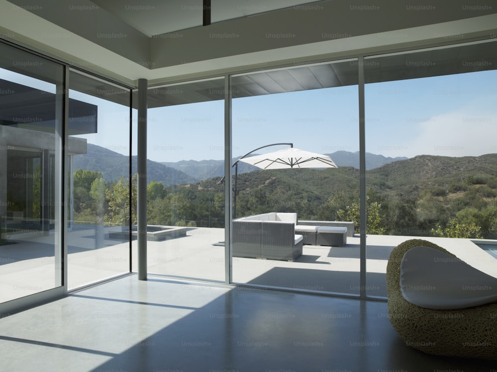 a room with a view of mountains and trees