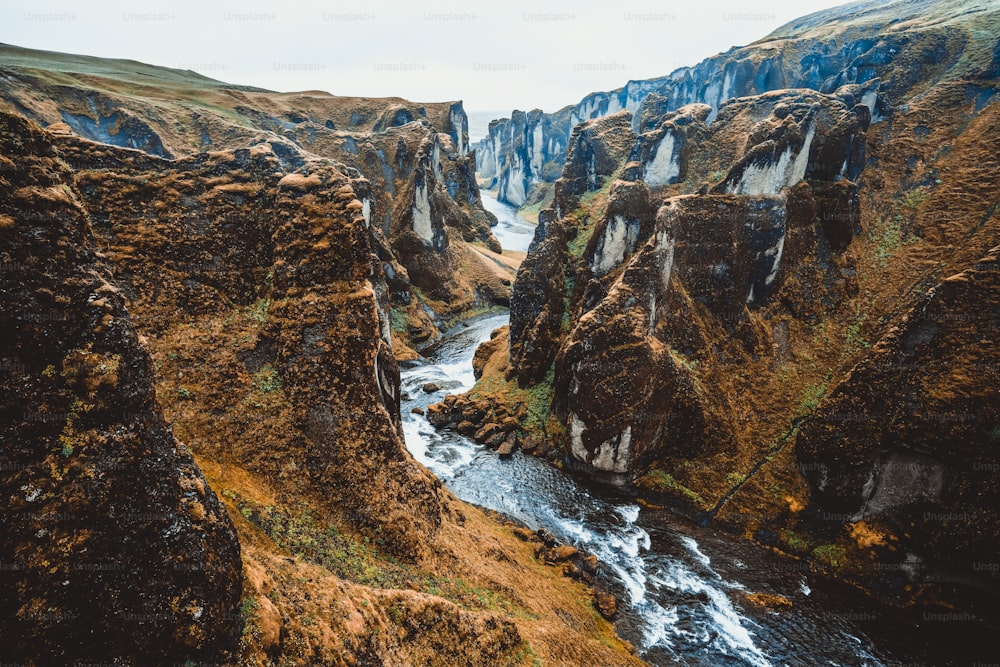 Unique landscape of Fjadrargljufur in Iceland. Top tourism destination. Fjadrargljufur Canyon is a massive canyon about 100 meters deep and about 2 kilometers long, located in South East of Iceland.