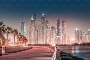 Majestic city view of skyscrapers and hotel buildings in the Dubai Marina area from the palm Jumeirah island in Dubai. Real estate and tourist attractions in the UAE