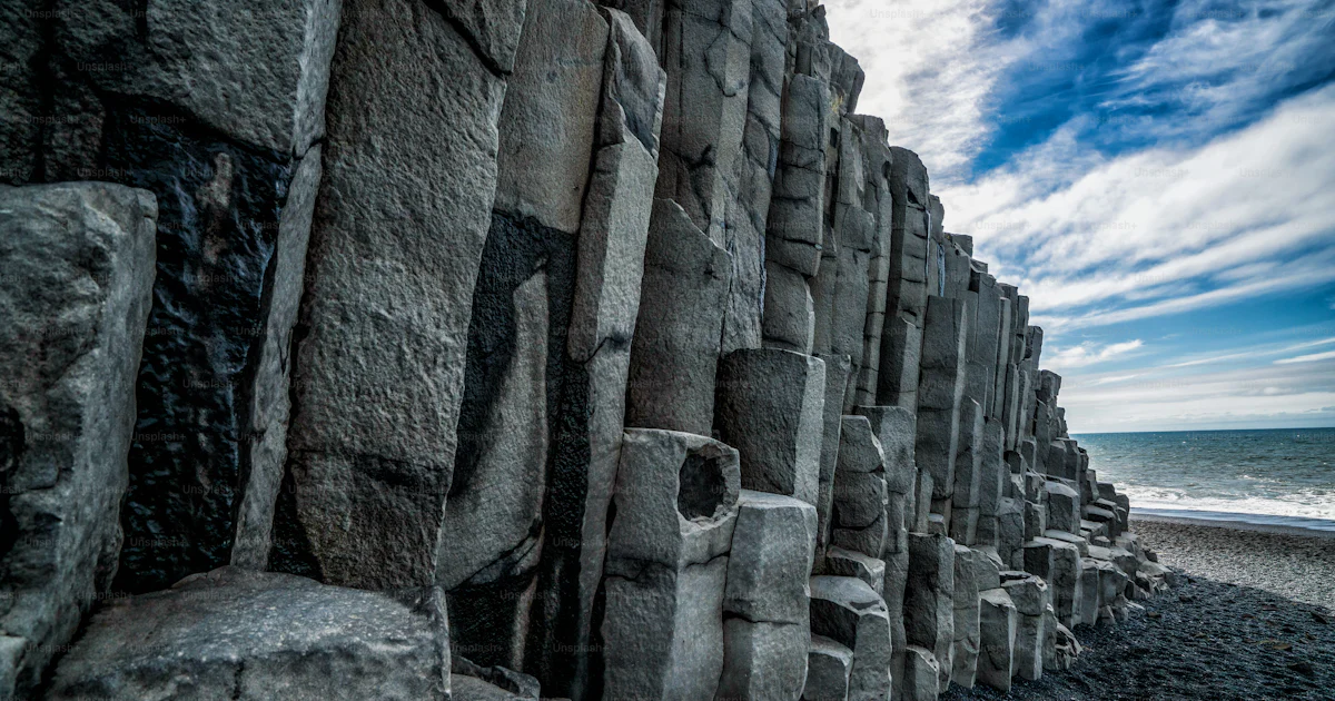 Beautiful and unique volcanic rock formation on Iceland black sand ...