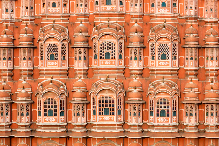 The carved pink sandstone facade of Hawa Mahal