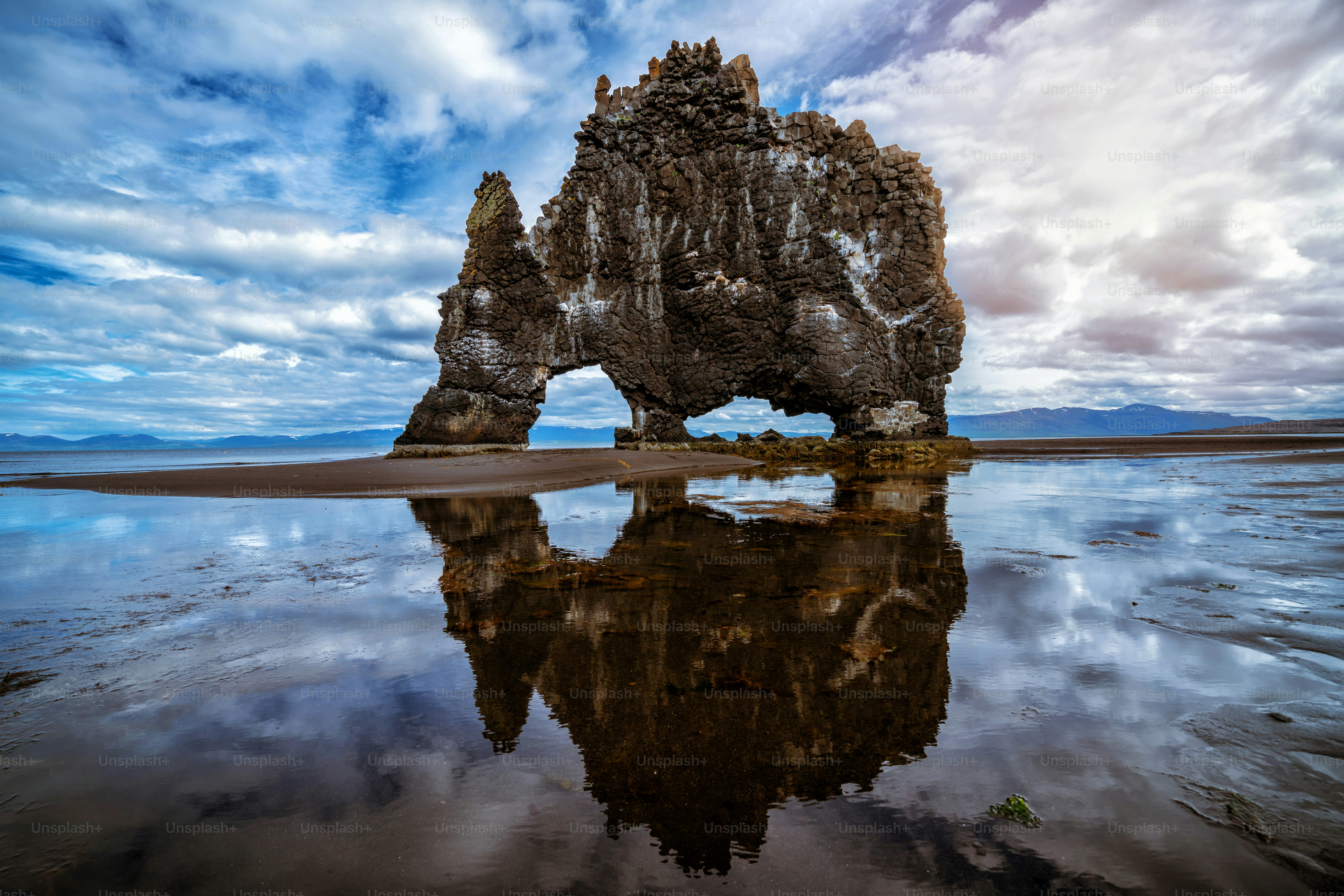 Hvitserkur unique basalt rock in Iceland. The majestic Hvitserkur is a 15 meter high monolith standing offshore of Vatnsnes peninsula in North-West Iceland. It's famous travel destination of Iceland.
