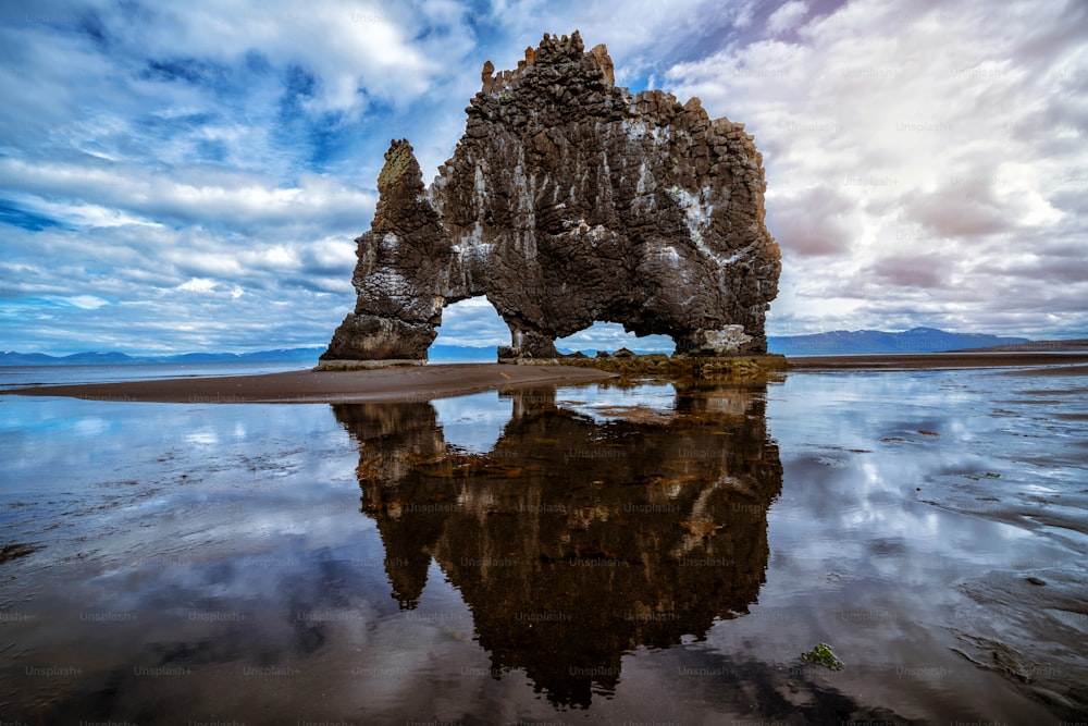 Hvitserkur unique basalt rock in Iceland. The majestic Hvitserkur is a 15 meter high monolith standing offshore of Vatnsnes peninsula in North-West Iceland. It's famous travel destination of Iceland.