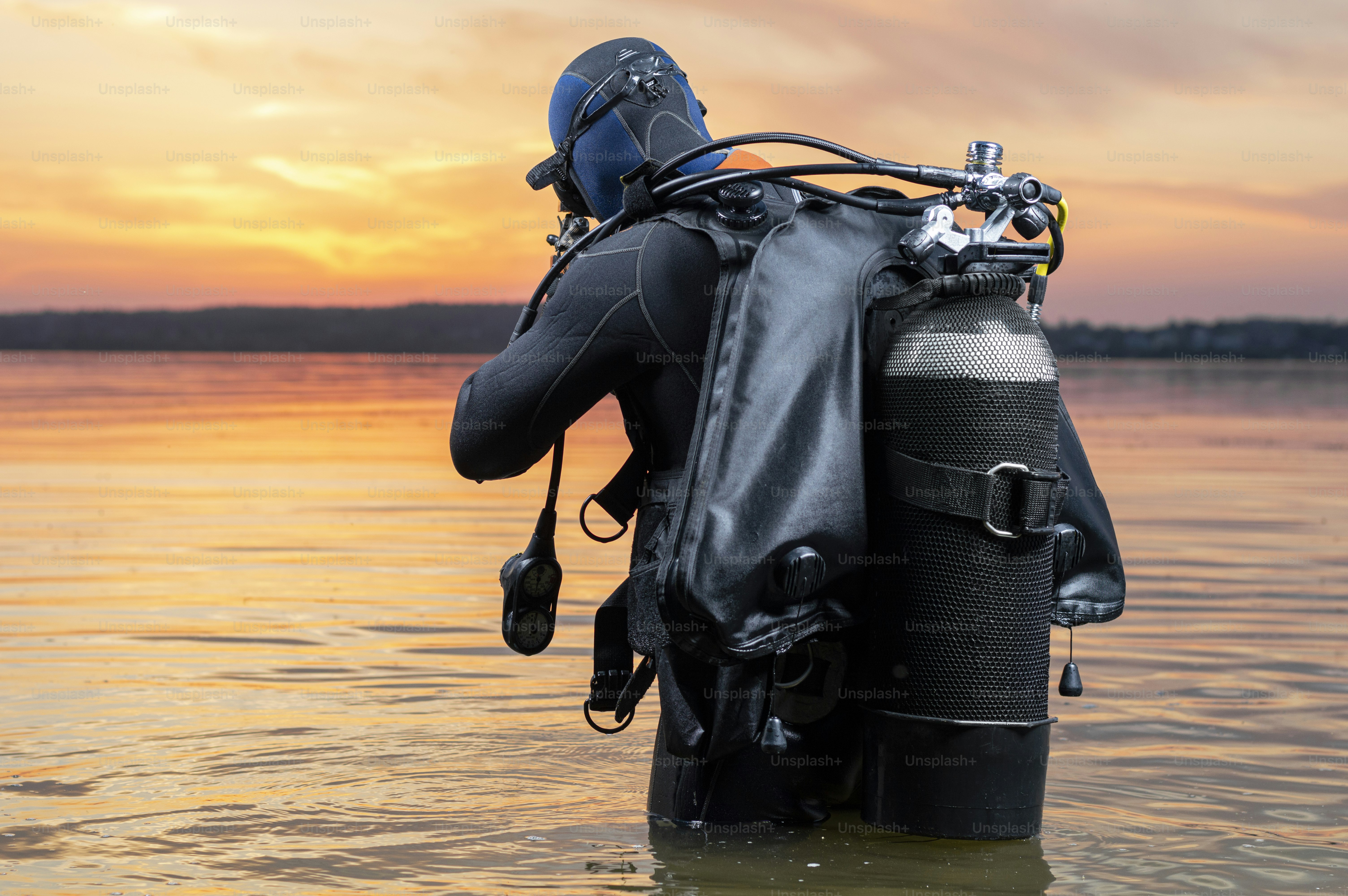 Fighter of a special unit is immersed in scuba diving. The concept of military operations, political resistance, the release of hostages. Mixed media