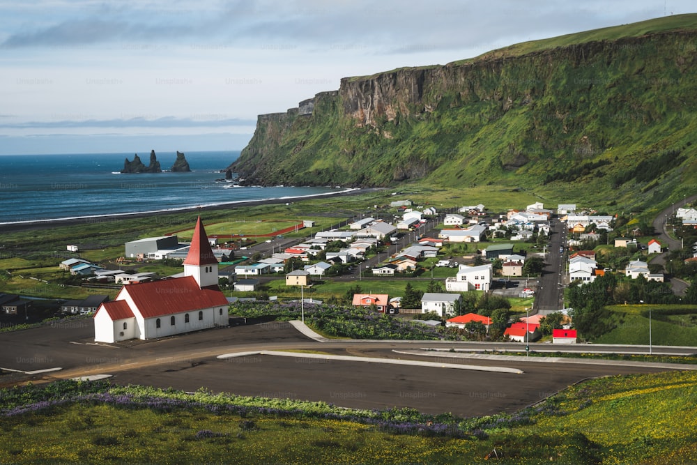 Beautiful town of Vik i Myrdal in Iceland in summer. The village of Vik  is the southernmost village in Iceland on the ring road around 180 km southeast of Reykjavík.