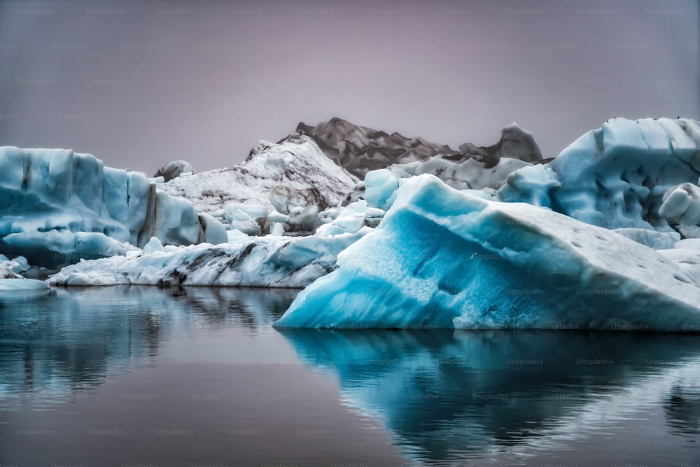 Icebergs in Jokulsarlon beautiful glacial lagoon in Iceland. Jokulsarlon is a famous travel destination in Vatnajokull National Park, southeast Iceland, Europe. Winter landscape.