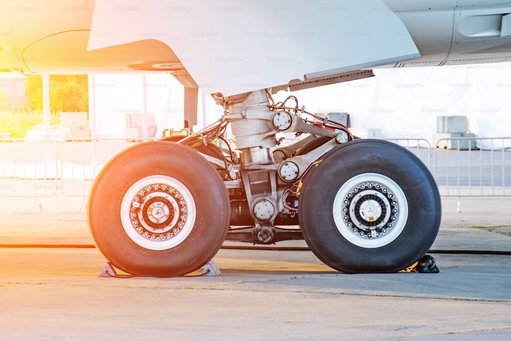 Aircraft rear landing gear with wheels and rubber, side view