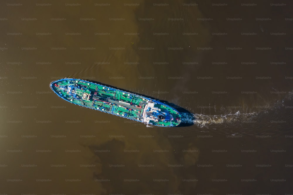 Aerial view of tanker ship sailing on river