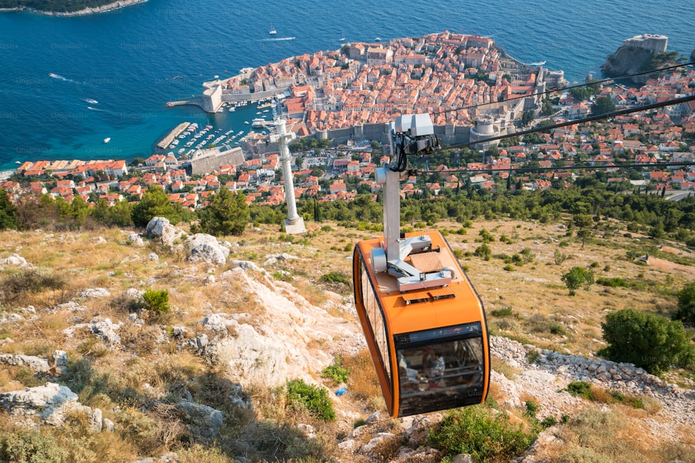Panorama view of cable car and Dubrovnik Old Town in Dalmatia, Croatia - Prominent travel destination of Croatia. Dubrovnik old town was listed as UNESCO World Heritage Sites in 1979.