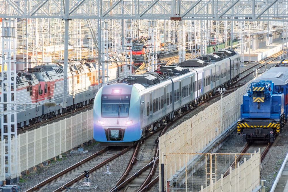 Suburban train passing through a freight station