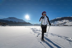 Snowshoe ride in a snowy expanse on the Alps