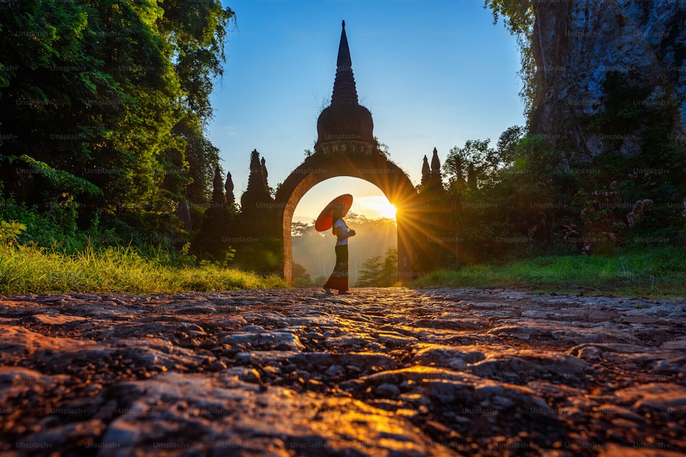Woman standing at Khao Na Nai Luang Dharma Park in Surat Thani, Thailand