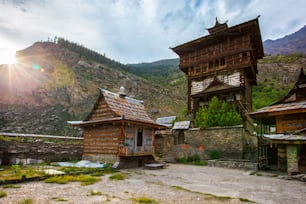 Sangla Fort - Hindu Temple. Sangla, Himachal Pradesh, India on sunset. Traditional architecture of Himachal Pradesh - layers of woods are alternated with broken stones