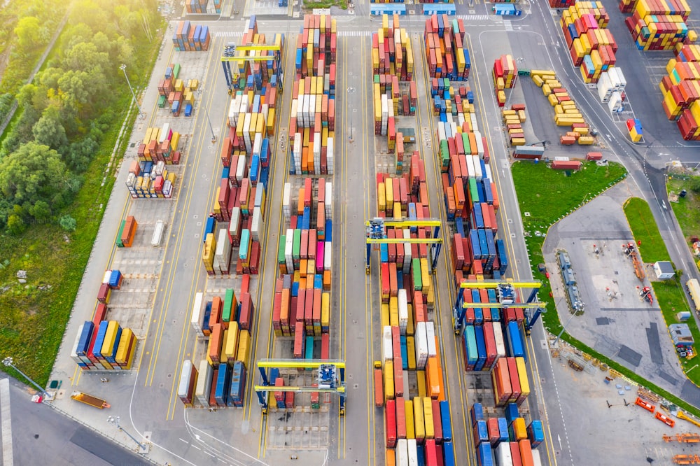 Aerial view of huge area with stacked cargo containers at the port