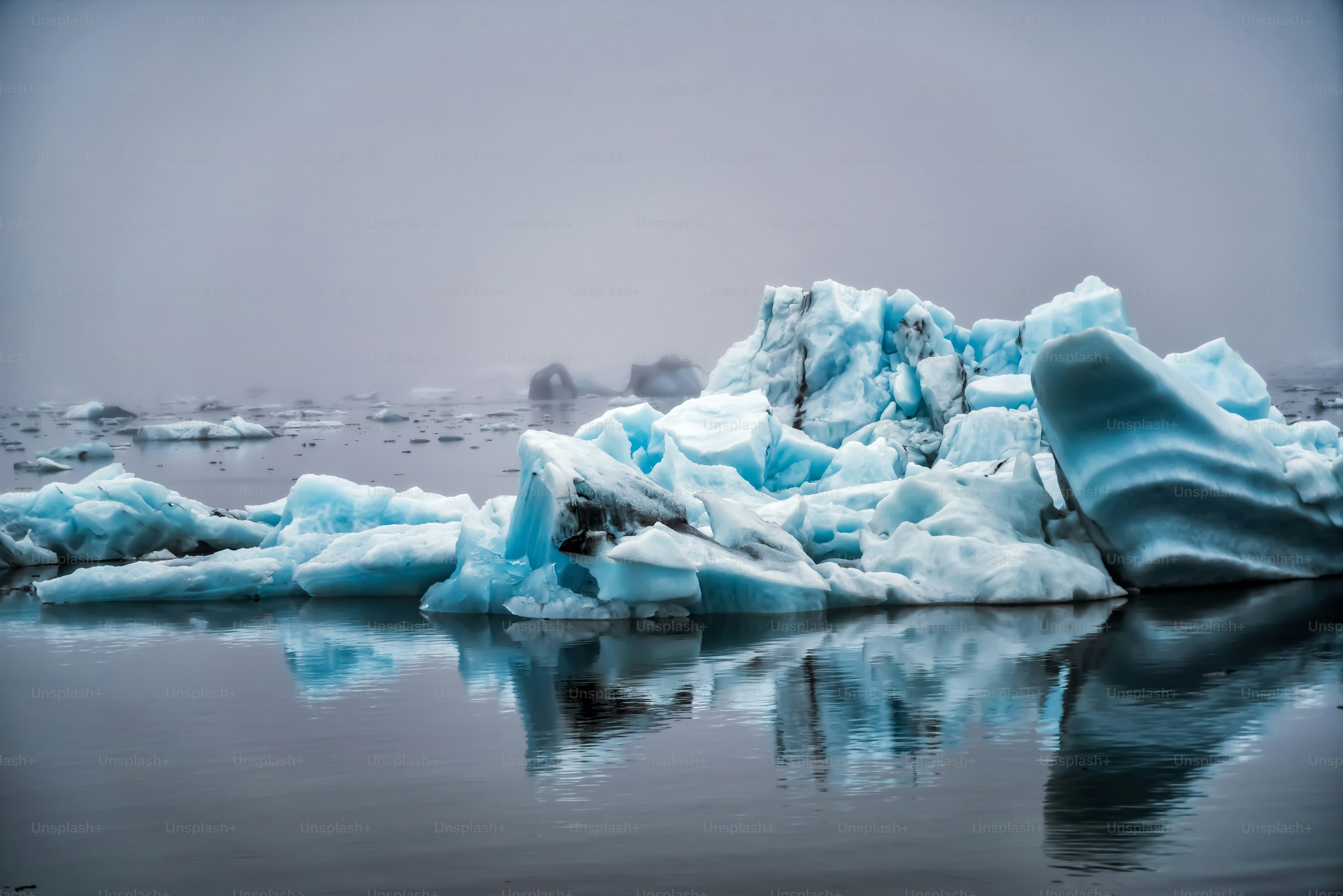 Icebergs in Jokulsarlon beautiful glacial lagoon in Iceland. Jokulsarlon is a famous travel destination in Vatnajokull National Park, southeast Iceland, Europe. Winter landscape.