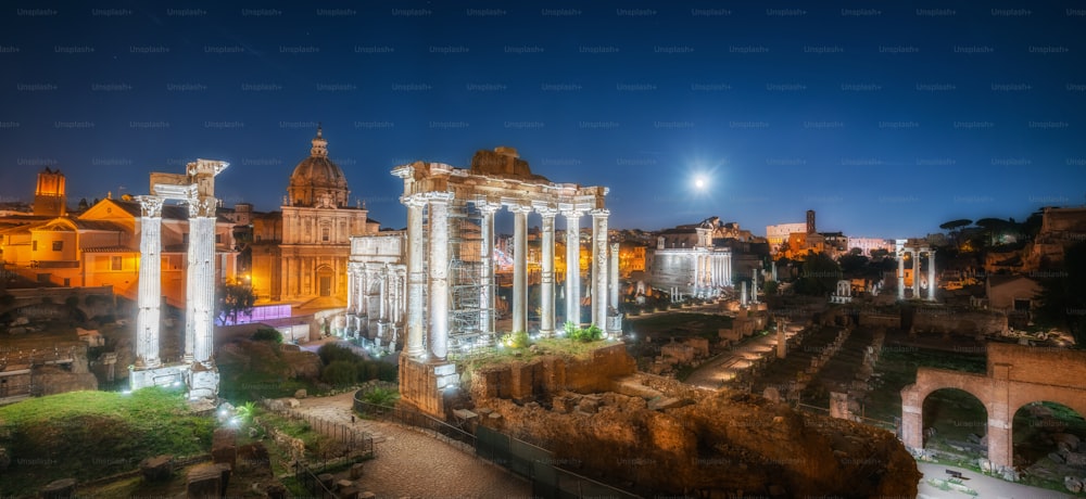 Roman Forum in Rome , Italy . Roman Forum was build in time of Ancient Rome as the site of triumphal processions and elections. It is famous tourist attraction of Rome , Italy .