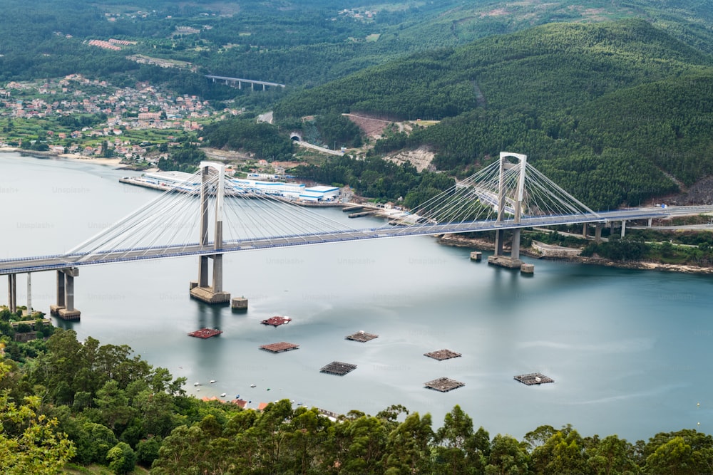 Aerial view of the recently extended Rande bridge crossing over the Ria the Vigo. Long exposure.