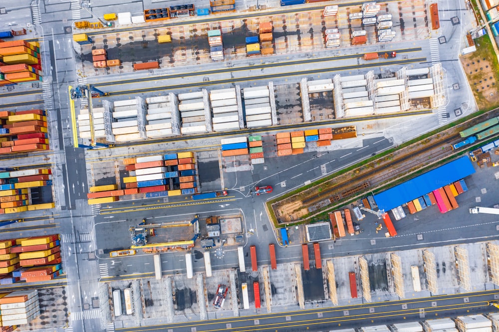 Industrial port area for the shipment of containers of goods and other raw materials, aerial top view