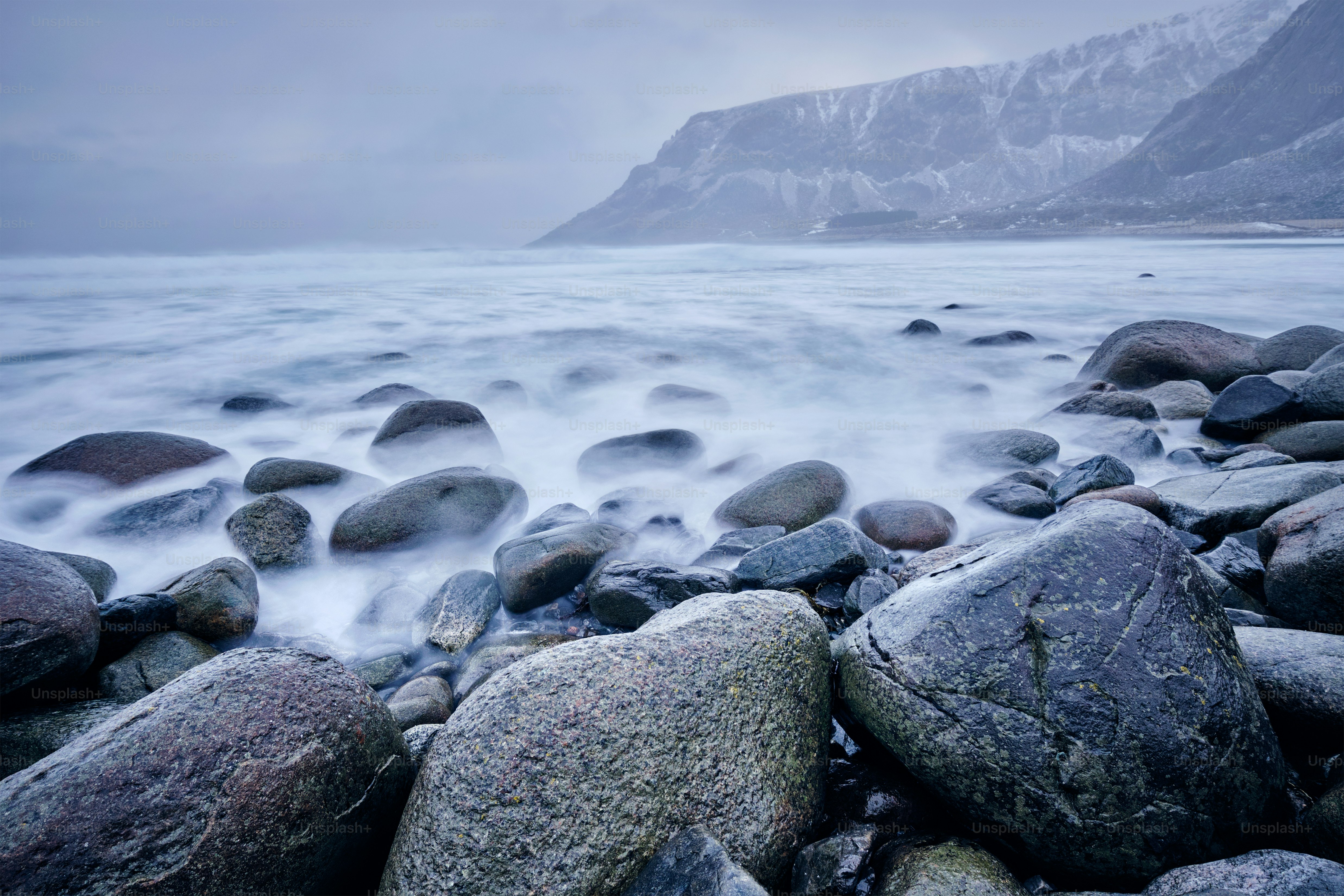 rocky-coast-of-fjord-of-norwegian-sea-in-winter-skagsanden-beach