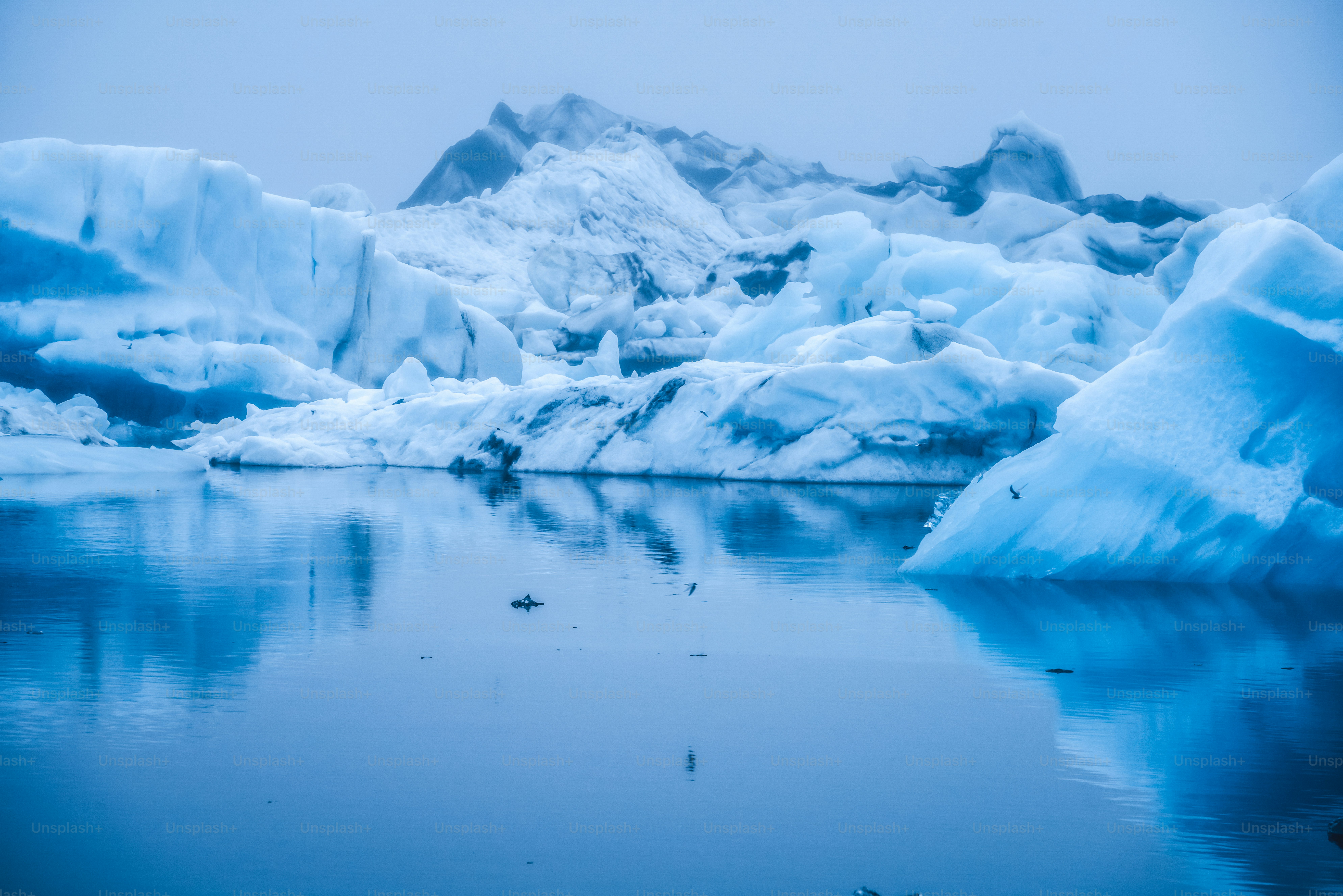 Icebergs in Jokulsarlon beautiful glacial lagoon in Iceland. Jokulsarlon is a famous travel destination in Vatnajokull National Park, southeast Iceland, Europe. Winter landscape.
