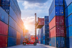 The logistics and transportation of Containers cargo shipping,loading by forklift truck business logistic import and export freight transportation.