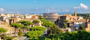 Rome, Italy city skyline with landmarks of the Ancient Rome ; Colosseum and Roman Forum, the famous travel destination of Italy.