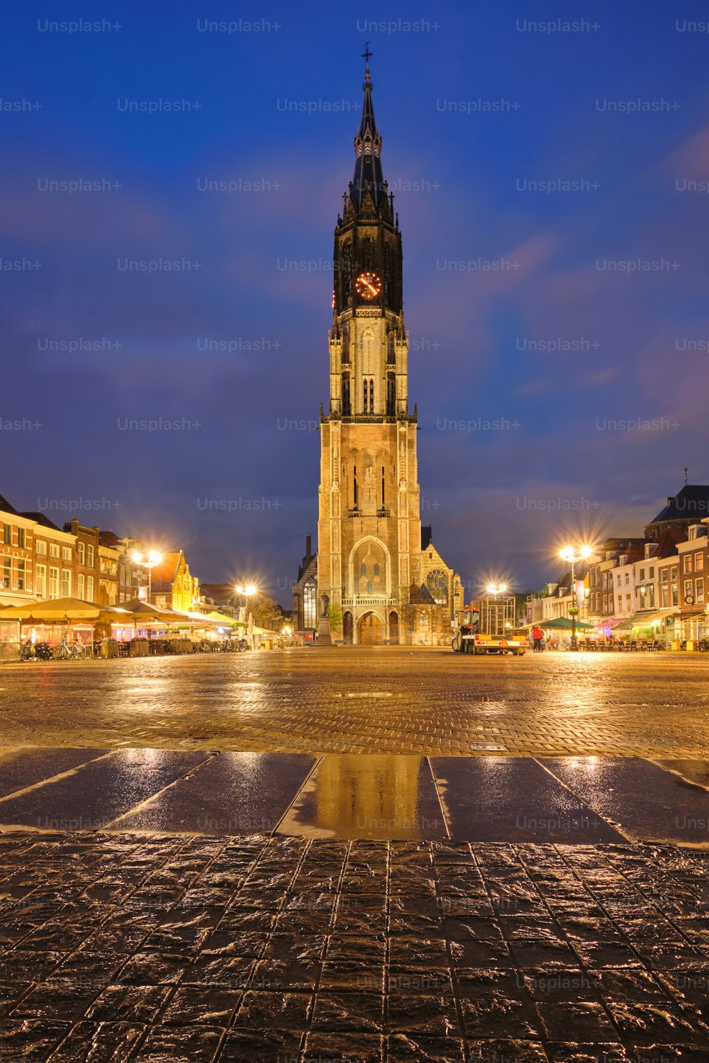 Nieuwe Kerk New Church protestant church on Delft Market Square Markt in the evening. Delft, Netherlands