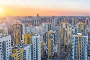 Huge residential area multi-storey high-rise buildings to the horizon, the evening sky view sunset light