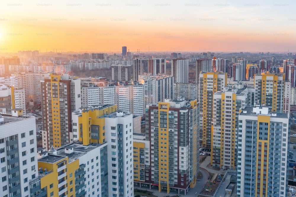 Huge residential area multi-storey high-rise buildings to the horizon, the evening sky view sunset light