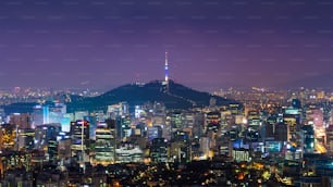 Downtown cityscape at night in Seoul, South Korea.