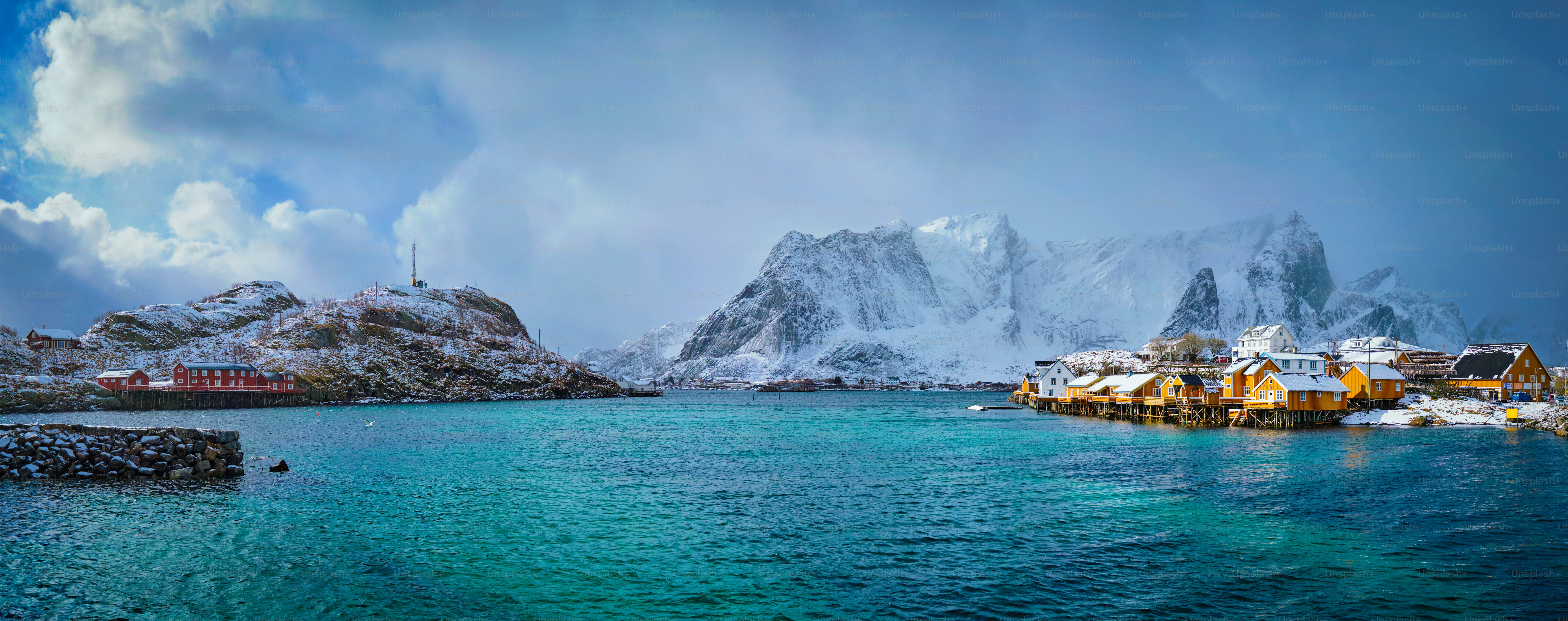 Panorama of yellow rorbu houses of Sakrisoy fishing village with snow in  winter. Lofoten islands, Norway photo – Travel Image on Unsplash, image size:3000x1187
