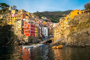 Riomaggiore of Cinque Terre, Italy - Traditional fishing village in La Spezia, situate in coastline of Liguria of Italy. Riomaggiore is one of the five Cinque Terre travel attractions.