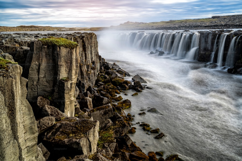 Amazing scenery of Selfoss waterfall in Iceland. Beautiful landscape and cascade of Selfoss waterfall attracts tourist to visit Northeastern Iceland. It is located near Dettifoss waterfall.