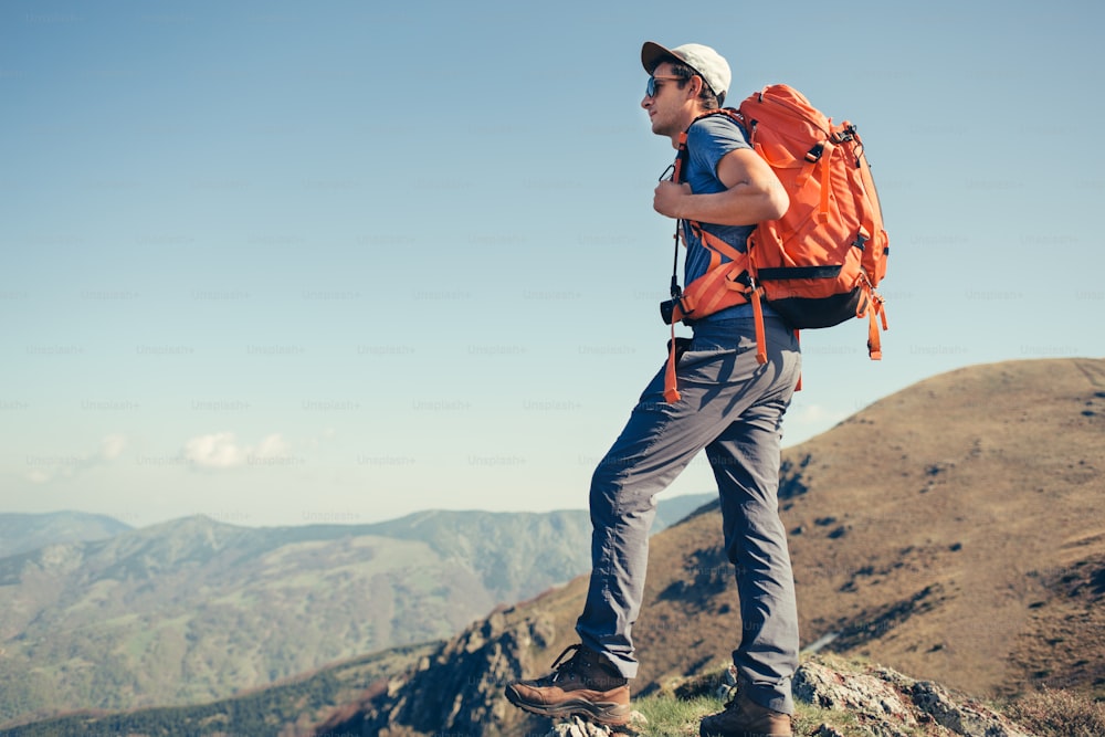 Portrait of backpacker posing in the mountains.