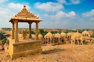 Tourist attraction and Rajasthan landmark - Bada Bagh cenotaphs (Hindu tomb mausoleum) made of sandstone in Indian Thar desert. Jaisalmer, Rajasthan, India