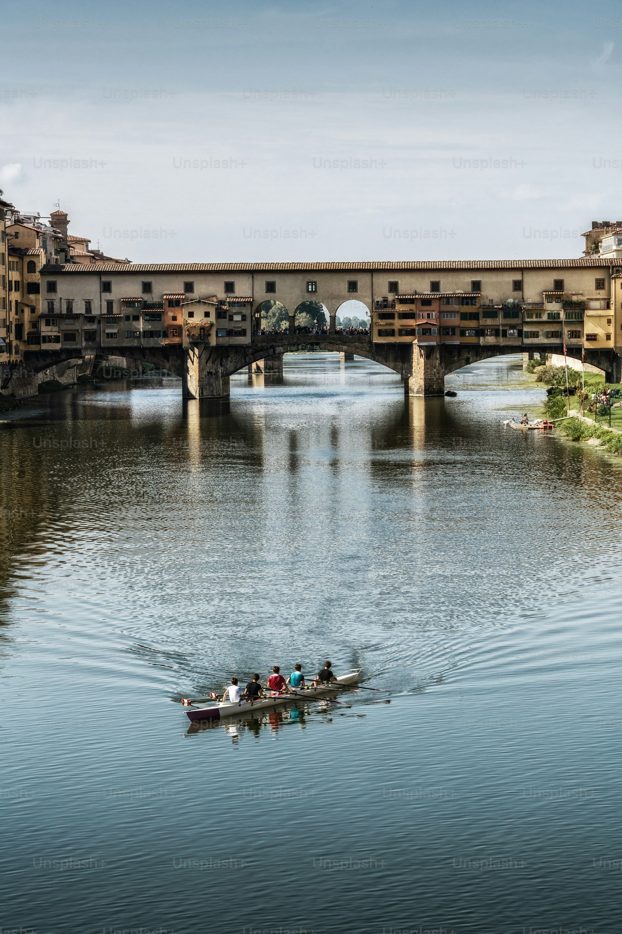 Florence Ponte Vecchio Bridge and City Skyline in Italy. Florence is capital city of the Tuscany region of central Italy. Florence was center of Italy medieval trade and wealthiest cities of past era.
