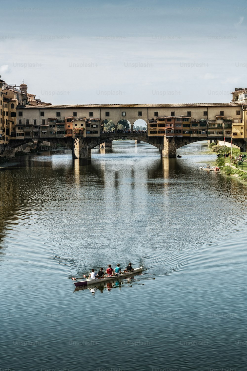 Florence Ponte Vecchio Bridge and City Skyline in Italy. Florence is capital city of the Tuscany region of central Italy. Florence was center of Italy medieval trade and wealthiest cities of past era.