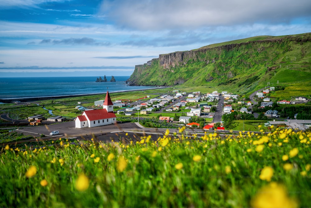 Beautiful town of Vik i Myrdal in Iceland in summer. The village of Vik  is the southernmost village in Iceland on the ring road around 180 km southeast of Reykjavík.