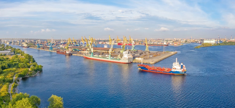 Panoramic aerial view of the industrial city port by the sea