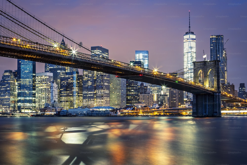 View of Brooklyn bridge by night, New York, USA