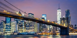 View of Brooklyn bridge by night, New York, USA