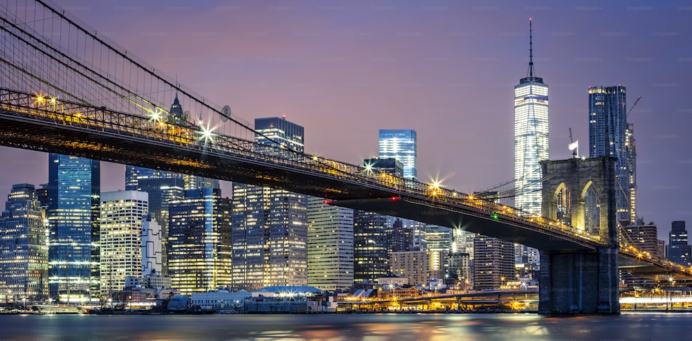 View of Brooklyn bridge by night, New York, USA