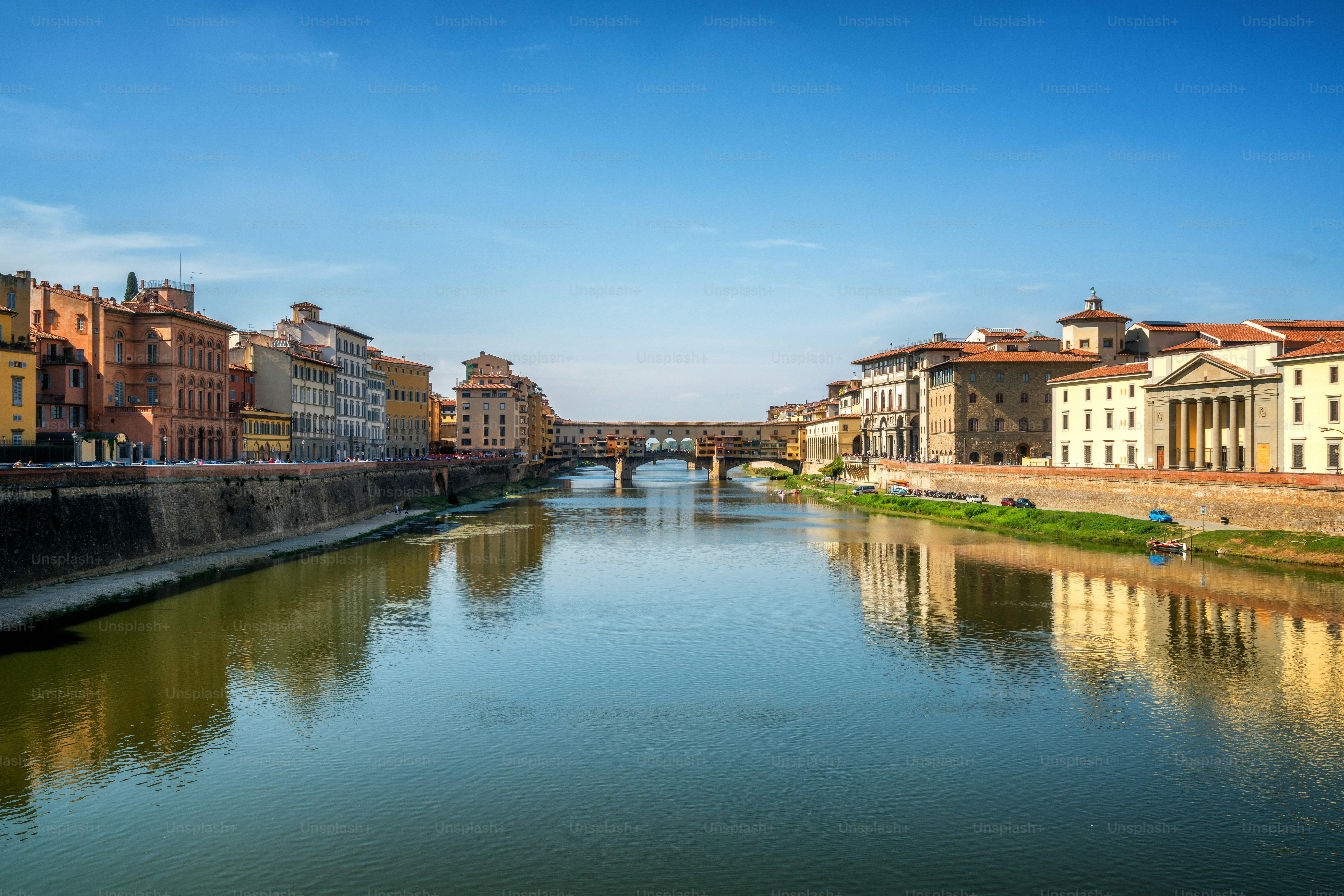 Florence Ponte Vecchio Bridge and City Skyline in Italy. Florence is capital city of the Tuscany region of central Italy. Florence was center of Italy medieval trade and wealthiest cities of past era.