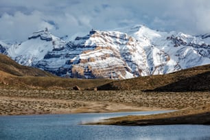 Himalayas mountains and mountain lake Dhankar Lake. Spiti Valley, Himachal Pradesh, India