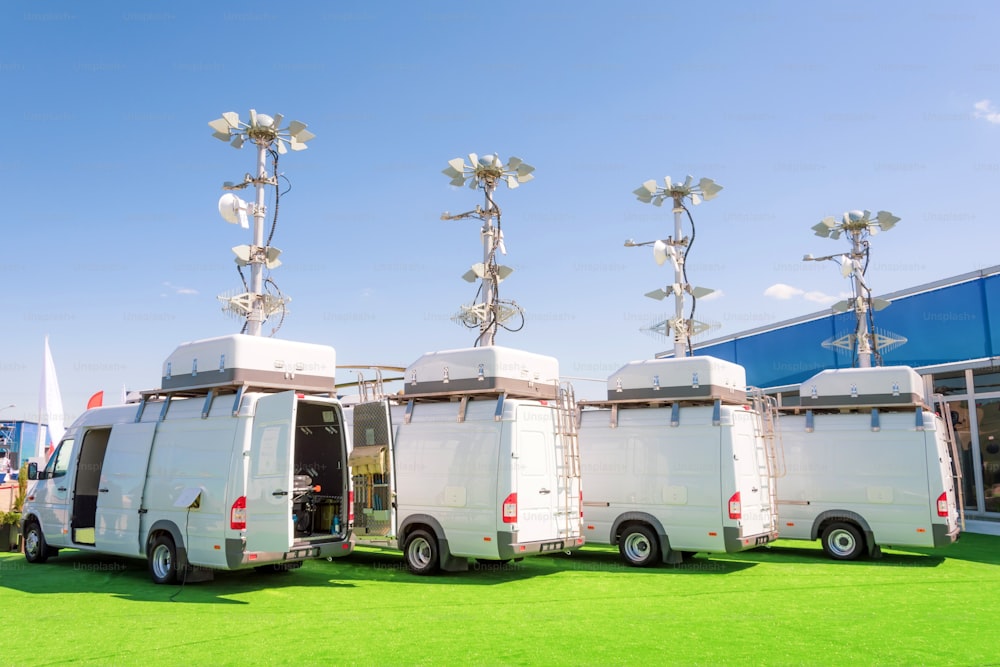 Powerful mobile antennas on the roofs of a van car for communication or location observation in the immediate radius of the space, mobile point of movement
