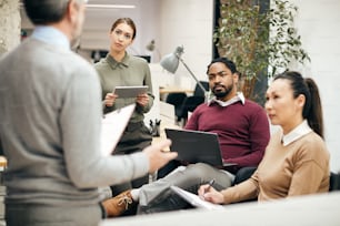 Group of entrepreneurs having business meeting at corporate office.