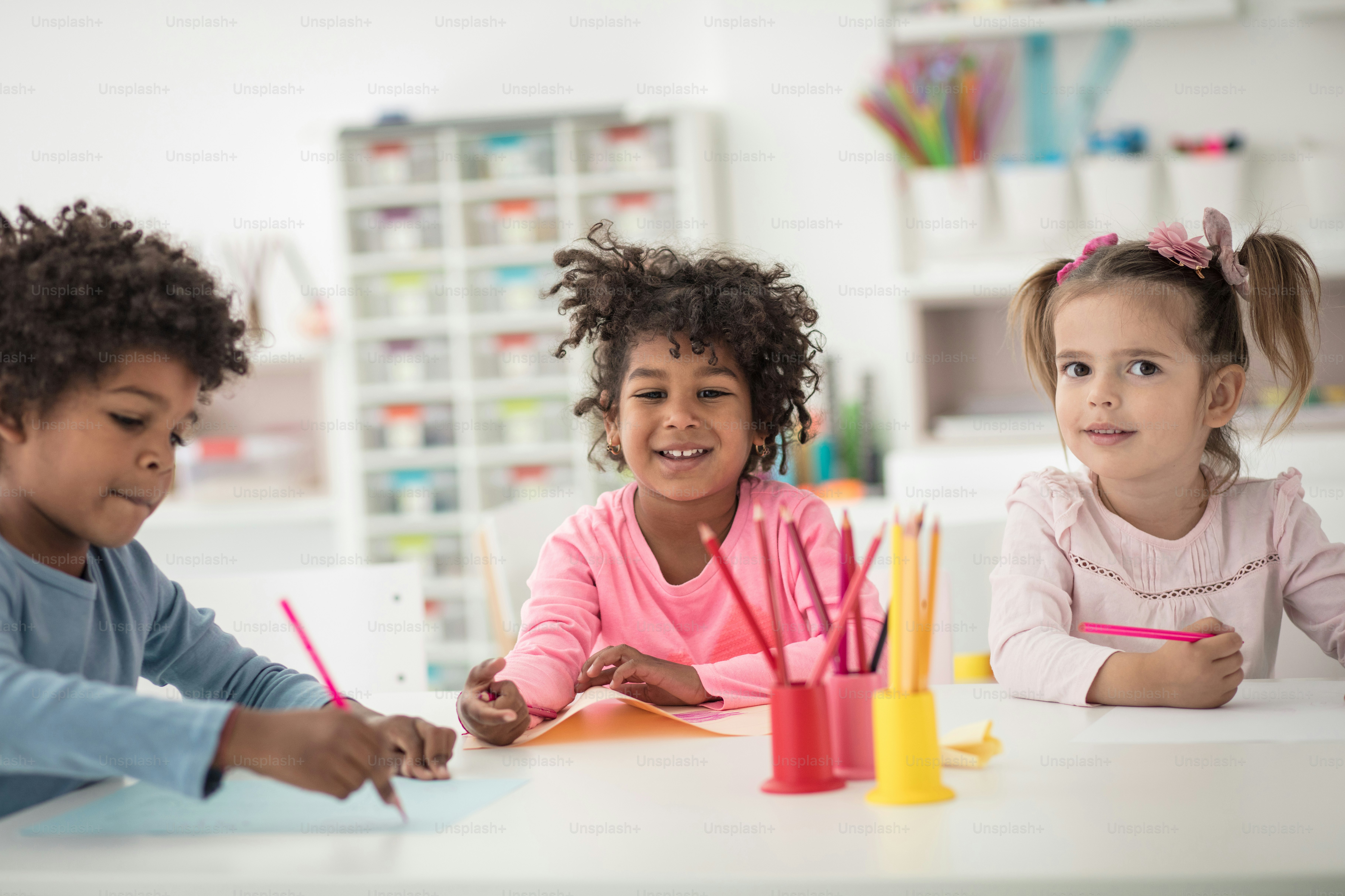 Adding a splash of more color to their bonding time. Children in preschool.