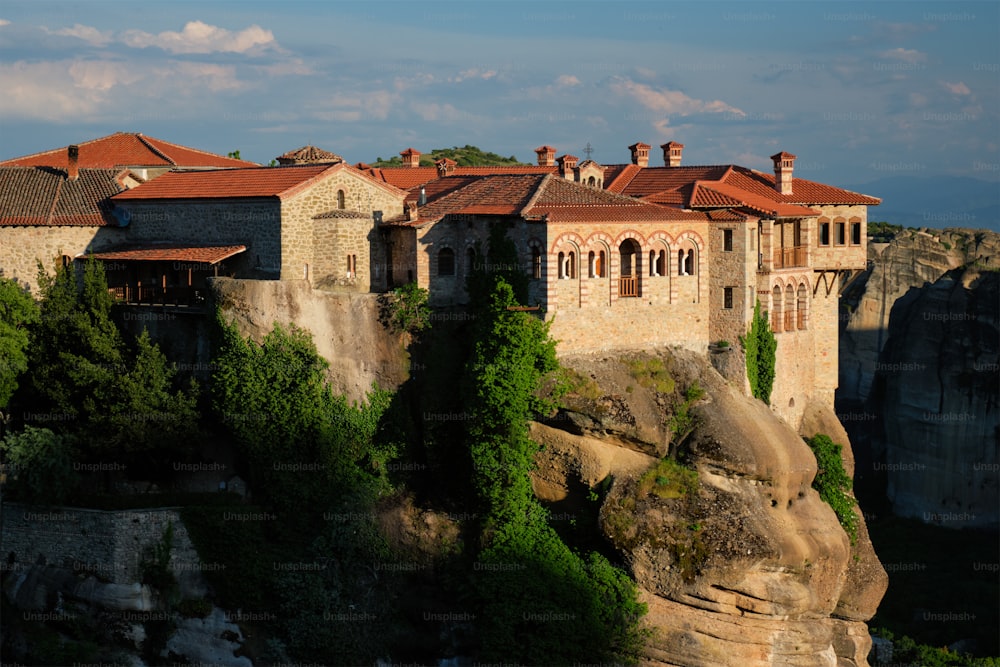 Monastery of Varlaam monastery in famous greek tourist destination Meteora in Greece on sunset with scenic scenery landscape