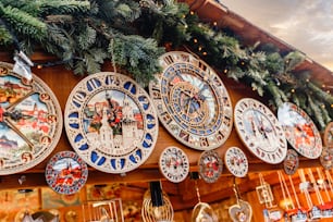 Souvenir reproductions of the astronomical clocks at christmas market in Prague